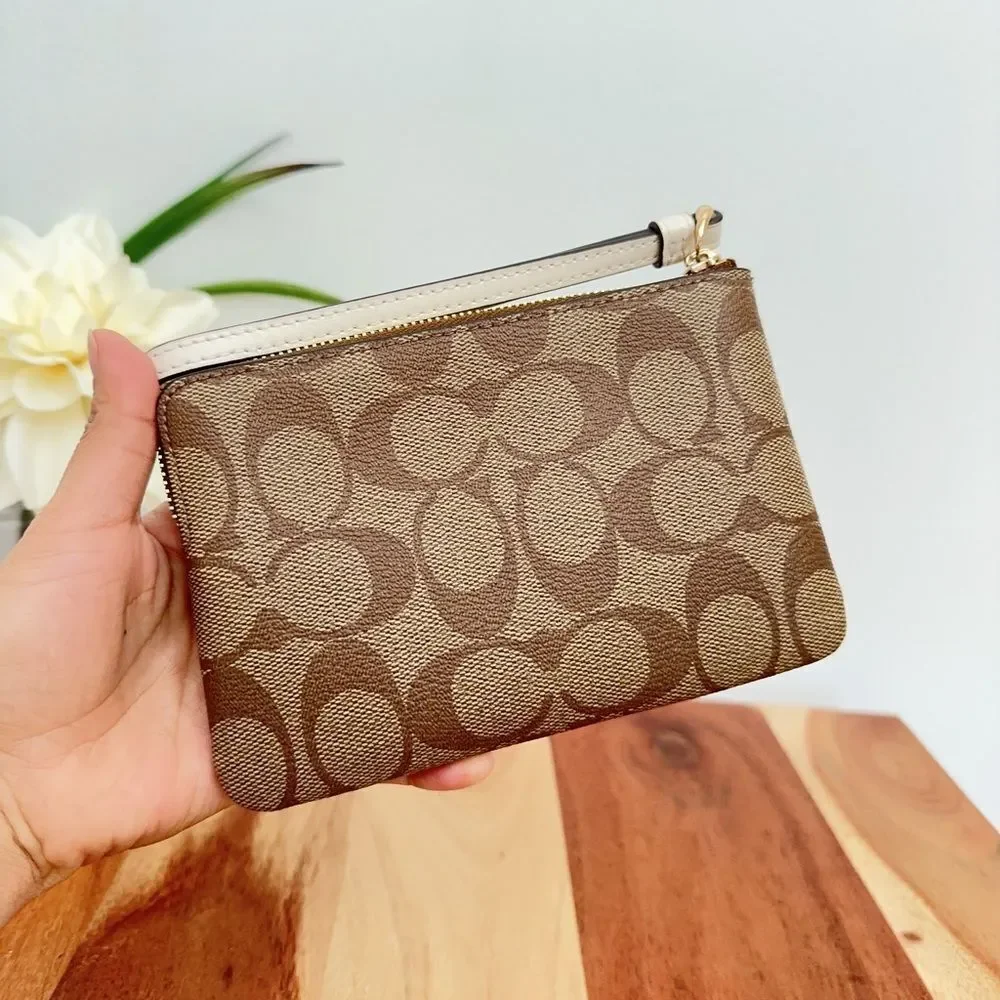 NWT Coach Corner Zip Wristlet In Signature Canvas With Horse‎ And Sleigh